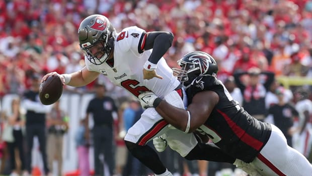 Tampa Bay Buccaneers quarterback Baker Mayfield (6) is sacked by Atlanta Falcons defensive tackle David Onyemata (90) in the fourth quarter at Raymond James Stadium.